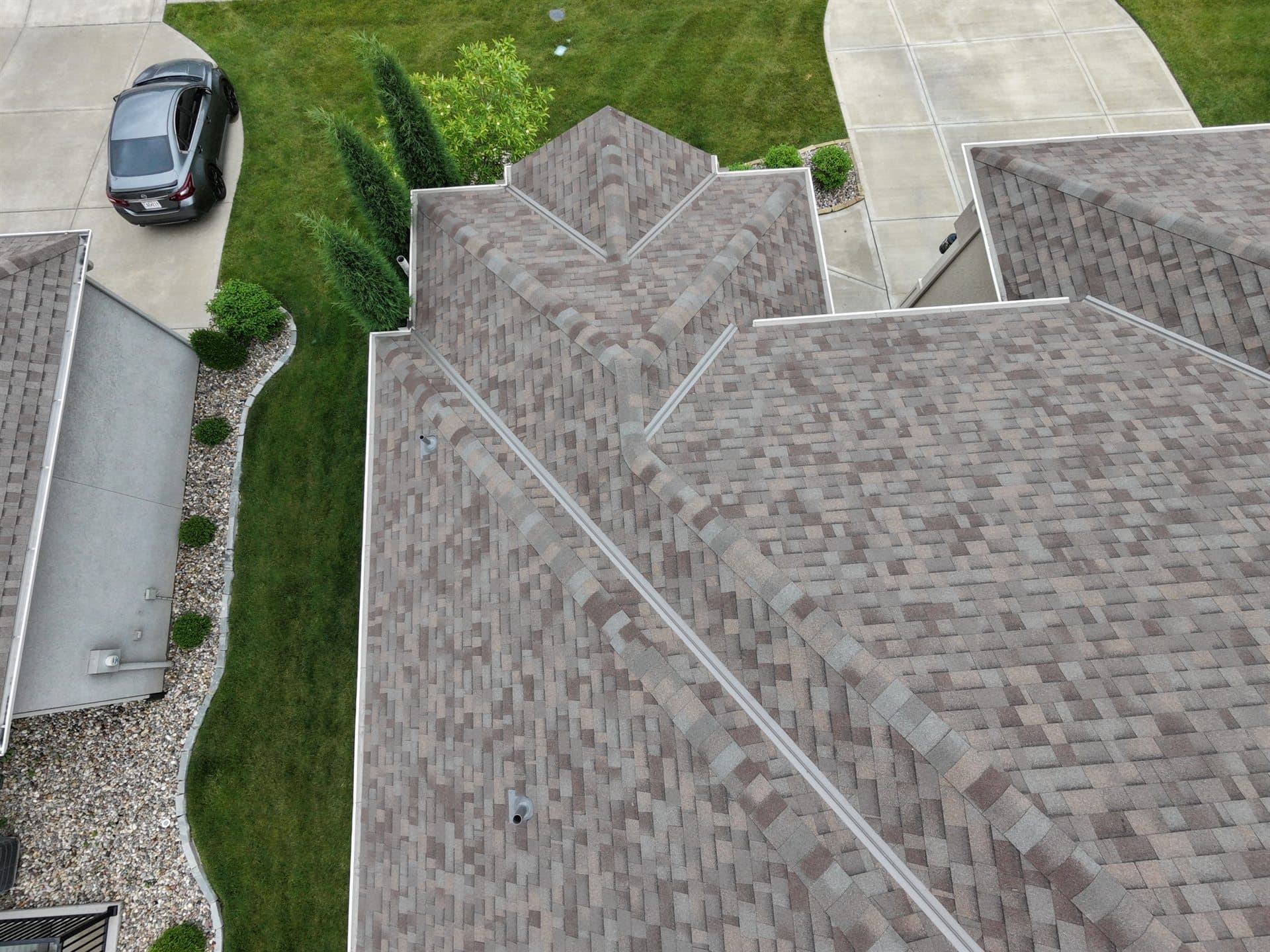Overhead drone shot of a completed roof replacement in Johnson County, KS