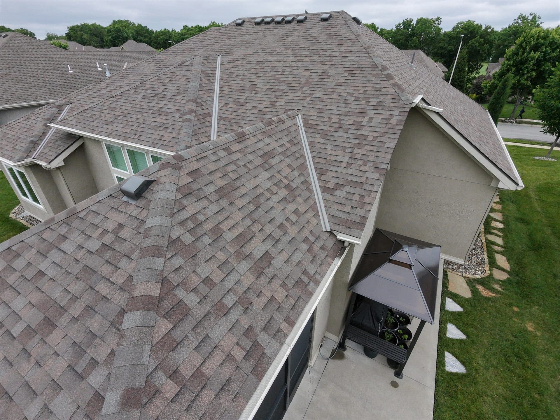 Overhead drone photo of a finished asphalt shingle roof in the Kansas City metro