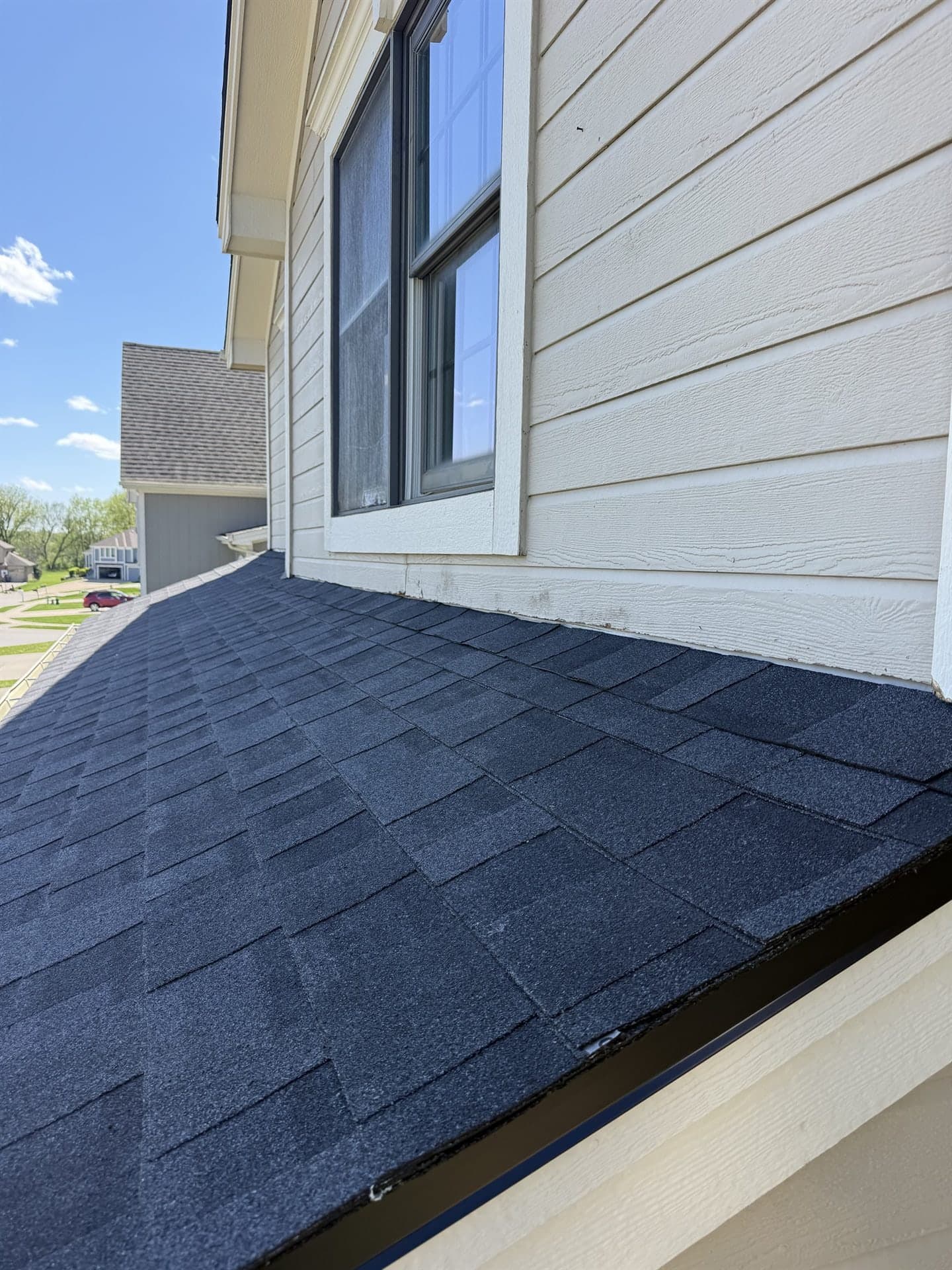New roof edge and siding detail on a Kansas home