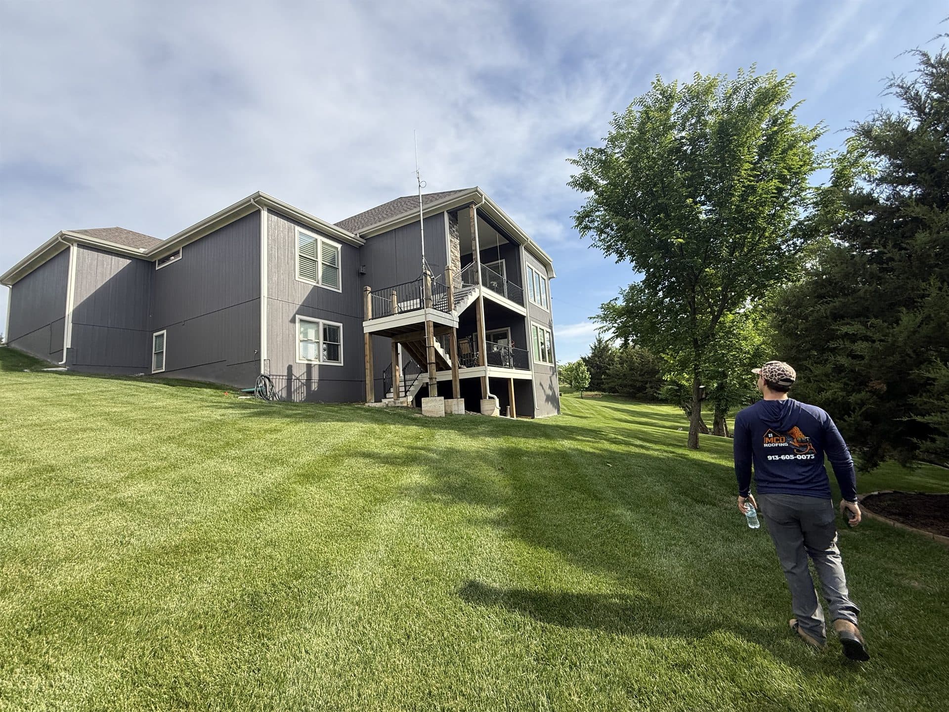 Finished roof replacement on a large suburban home in Johnson County, KS