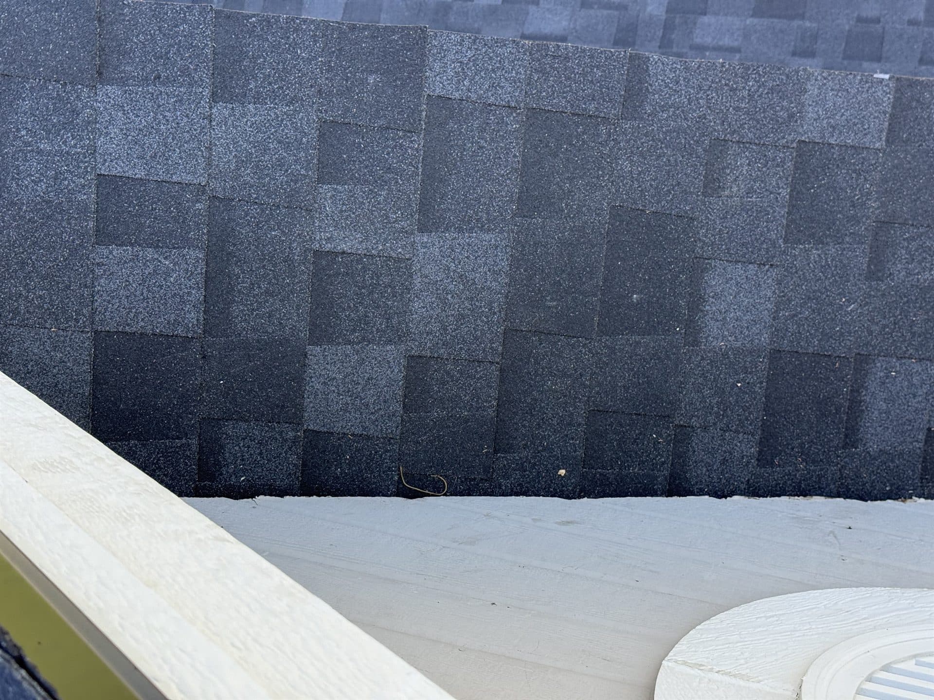 MCO Roofing professional inspecting a roof in Johnson County, KS