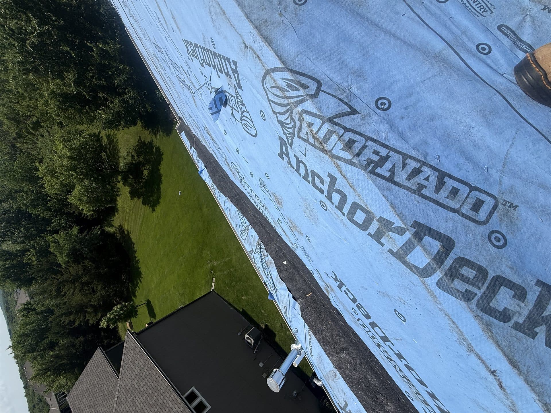 Synthetic underlayment installed on the roof deck before shingles in Johnson County, KS