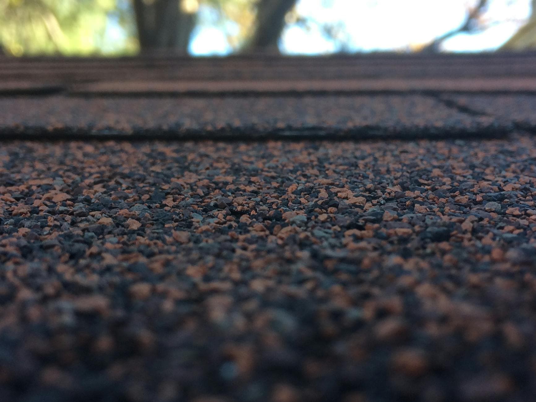 Close-up of damaged vent boot on a Kansas roof