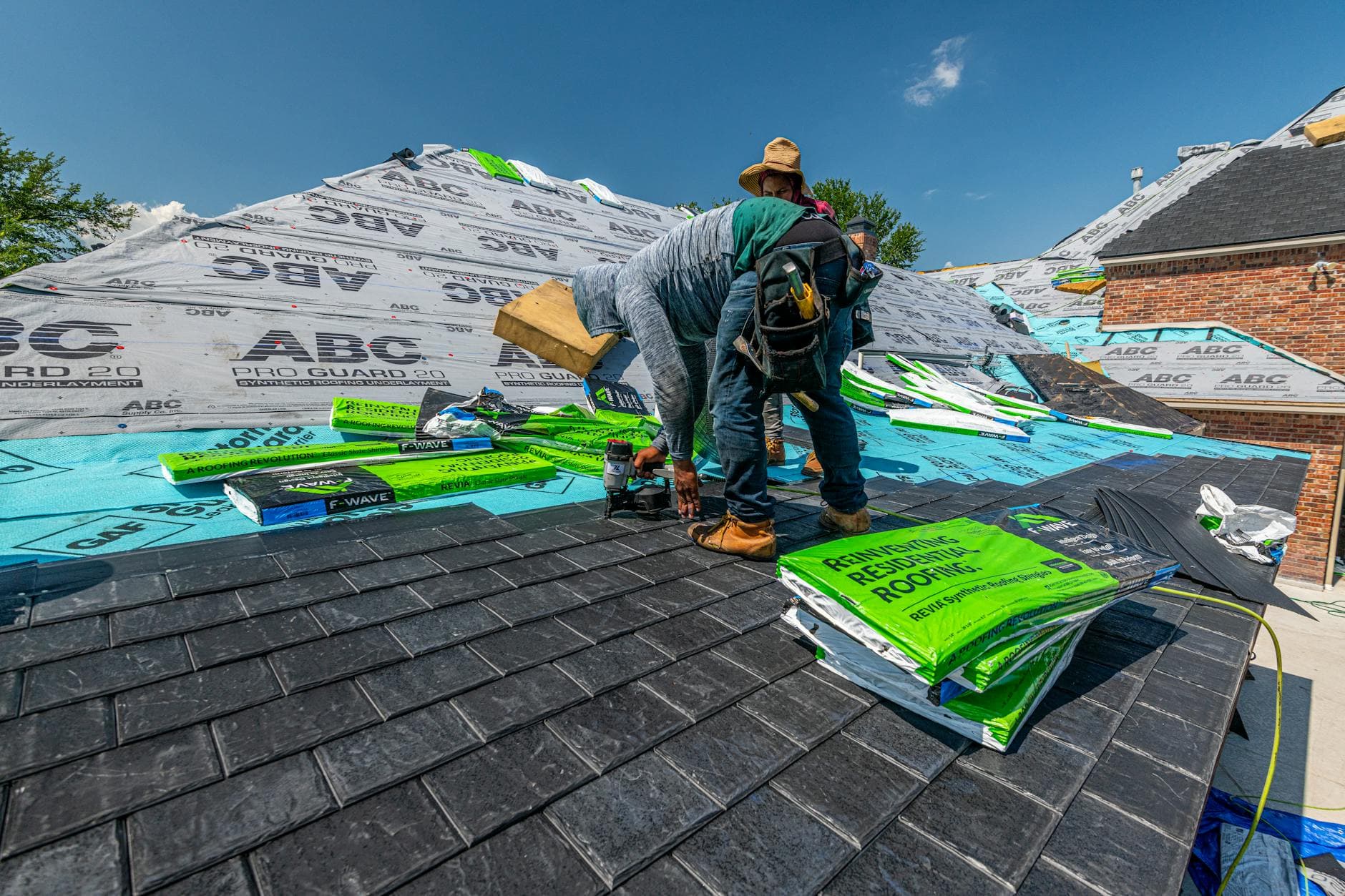 Kansas homeowner inspecting roof in early spring
