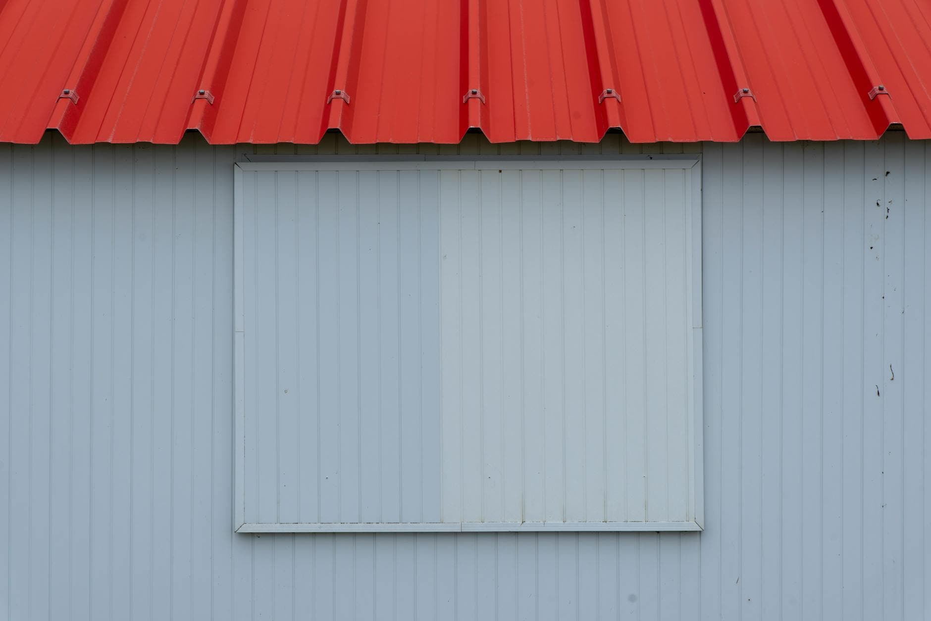 Close-up of standing seam metal roof panels with hidden fasteners