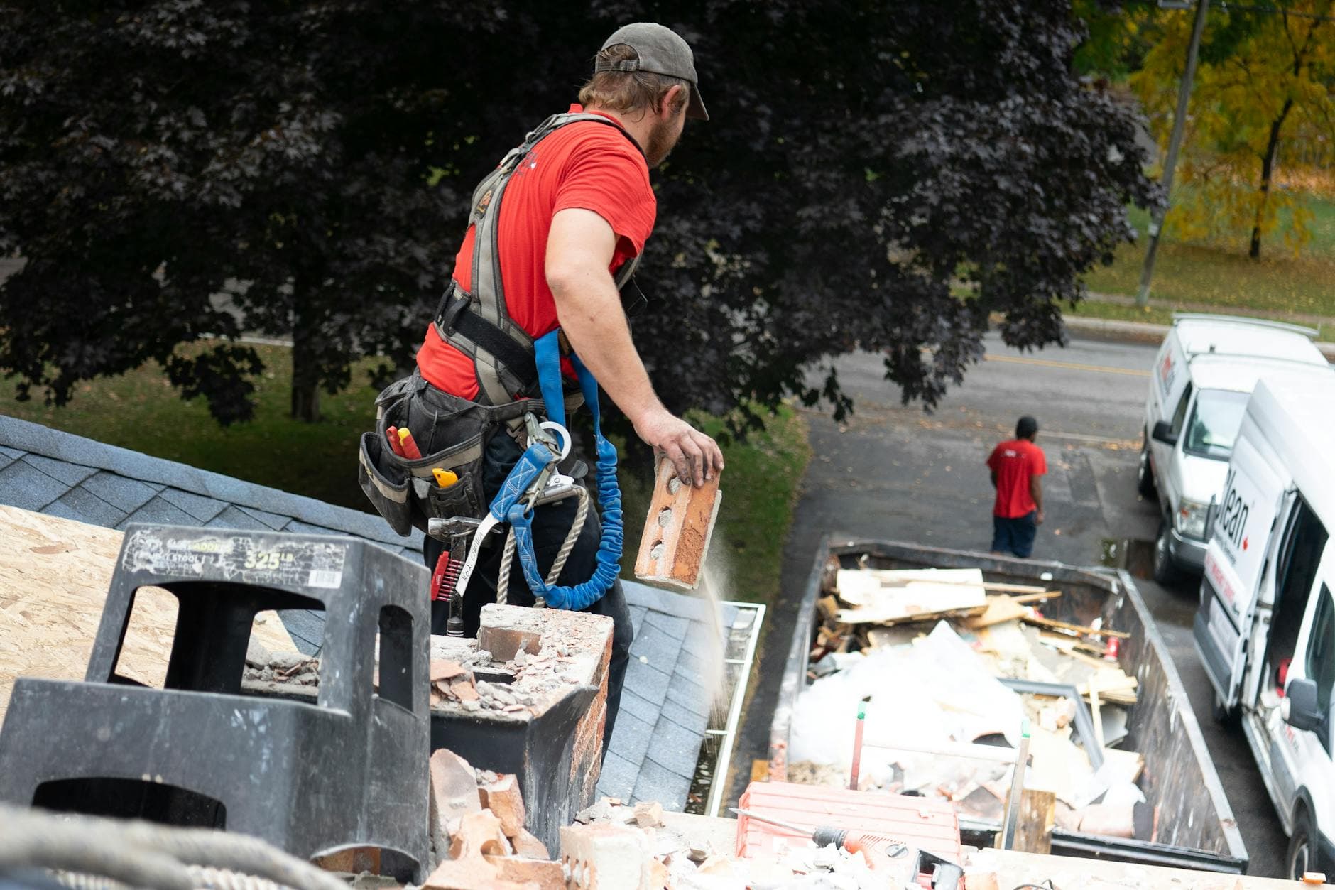 Storm chaser roofing van with out-of-state plates in Kansas neighborhood
