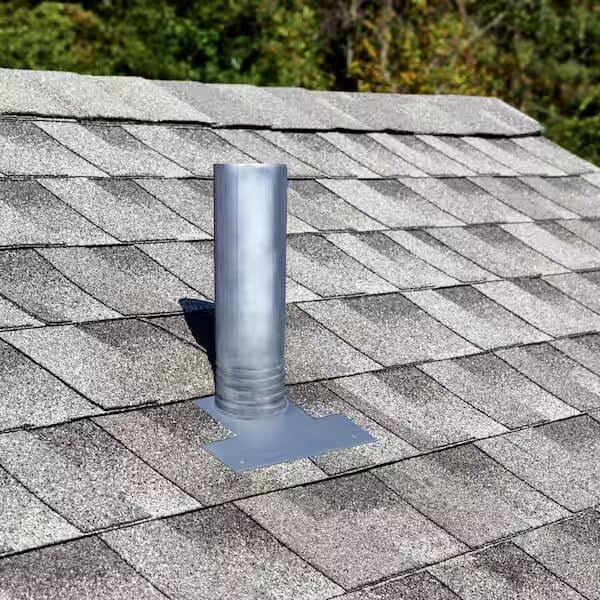 Metal plumbing vent pipe with a flashing base on gray asphalt shingles