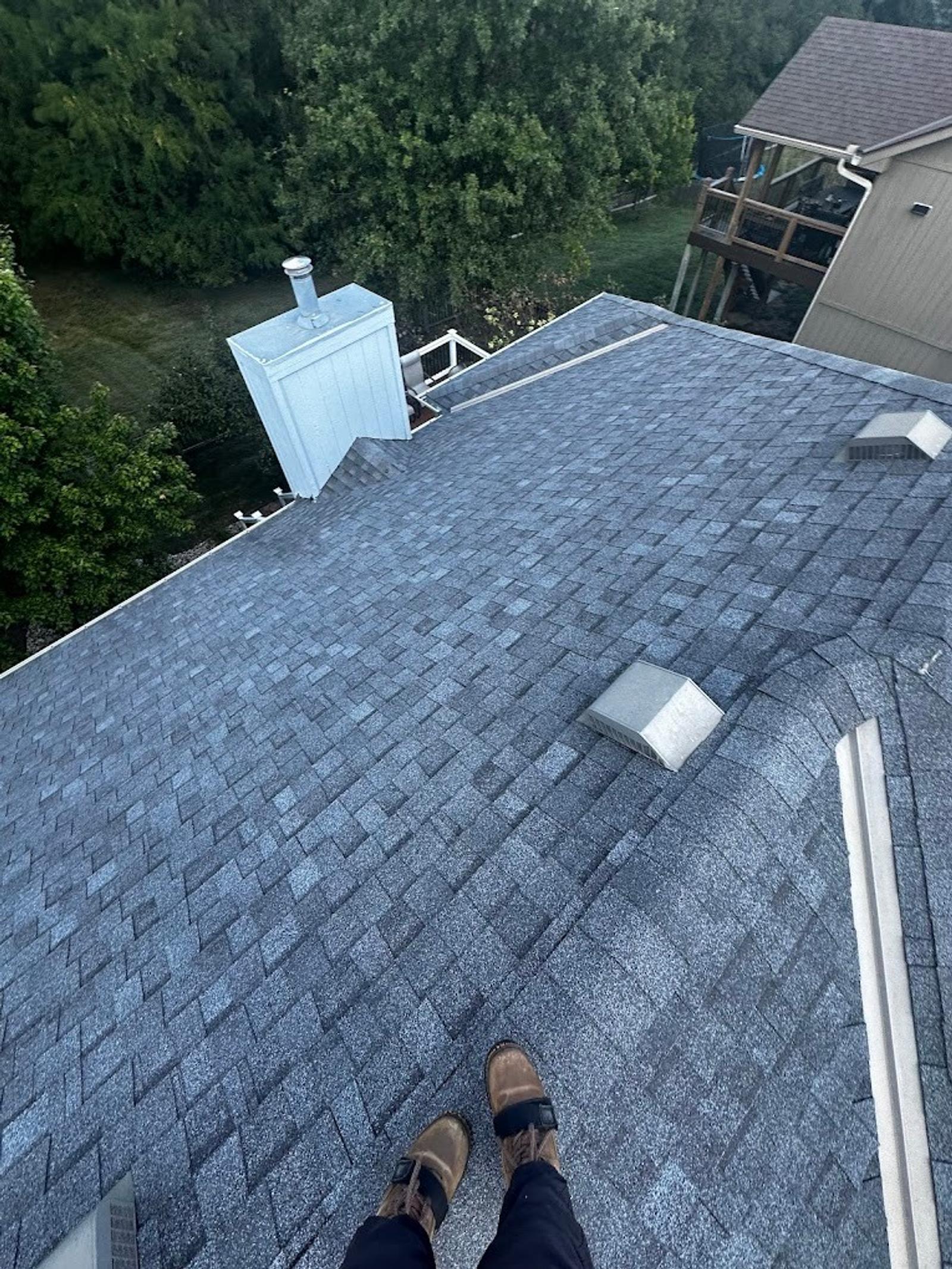 Aerial drone view of completed roof installation